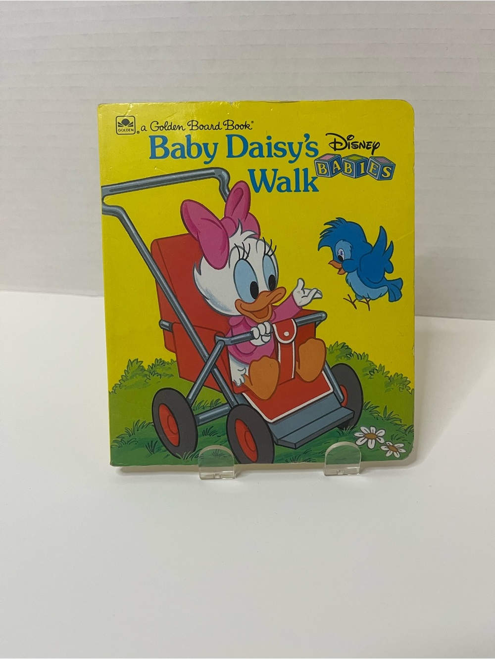 a Golden Board Book- 6095- Disney Babies- Baby Daisy’s Walk- Vintage Board Book